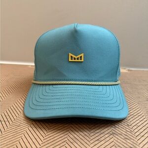 Melin Brand Blue and Yellow Snapback Hat